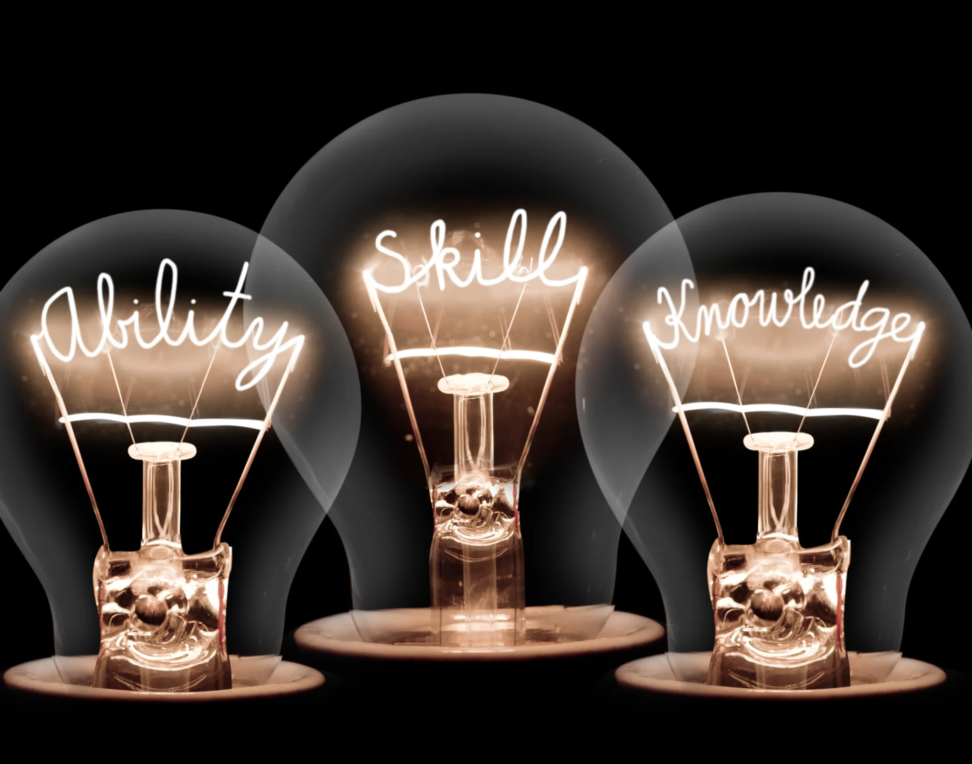 Three illuminated light bulbs